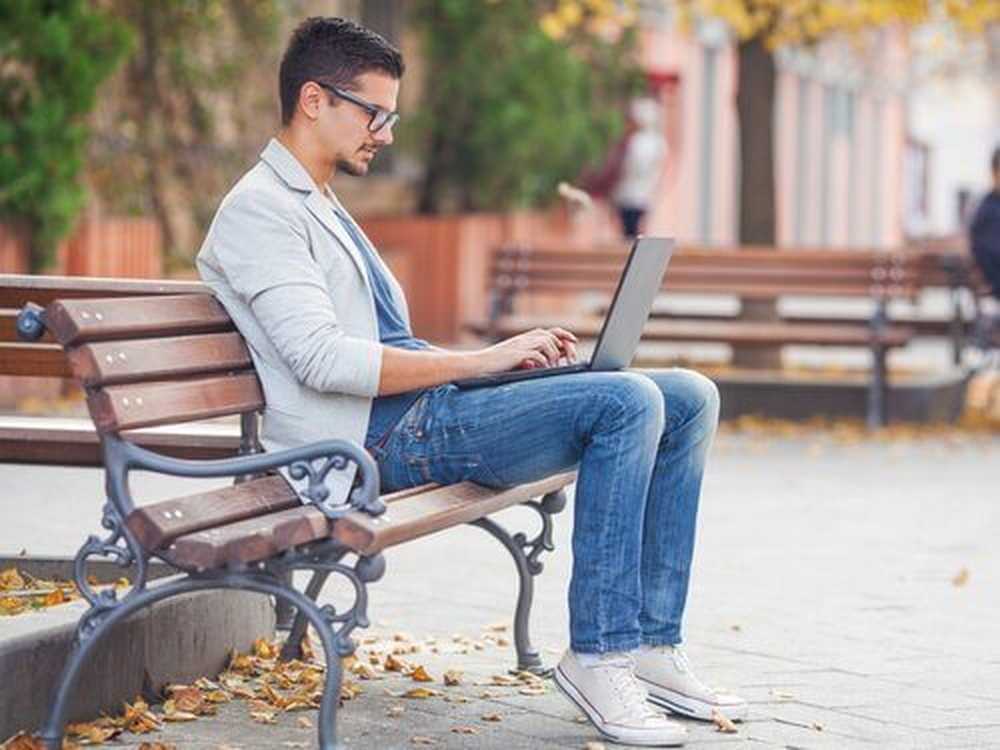 Young man sit. Cristiano sitting on the Bench. Sitting man with Laptop Black PNG.